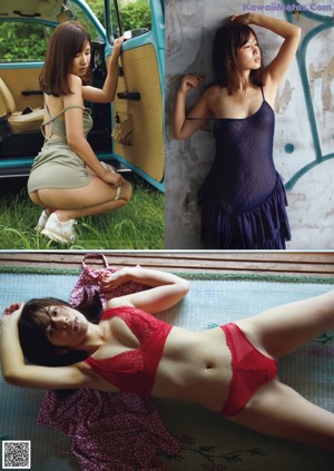 A woman in a red dress sitting on the ground.